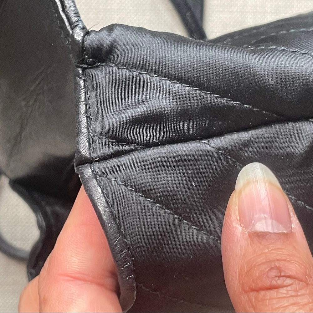 CHANEL Black Quilted Crossbody Bag with Pearl Flower Medallion - Picture 9 of 13